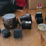 Vivitar Auto Thyristor 550FD Flash W/ Konica Film Camera, Lenses, Filter, Case. Fixed Price $125.00.
