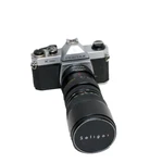 Pentax Asahi K1000 Film Camera With Telephoto Lens Soligor F=85-205MM. Fixed Price $130.00.