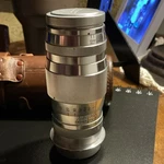 Canon Serenar 100MM F/3.5 Telephoto Prime Lens W/ Cap & Leather Case. Fixed Price $175.00.