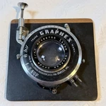 Vtg Graflex Optar Lens 135MM F4.7 In Graphex Shutter Mounted On Graphic Board. Fixed Price $78.76.