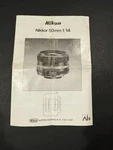 Nikon Nikkor 50MM F/1.4 Lens Pamphlet. Fixed Price $7.80.