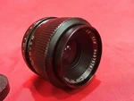 Carenar Auto Lens 1 : 3.5 F = 35 Camera 52MM Zoom Made In Japan Top. Fixed Price $30.00.