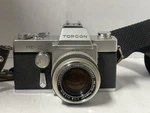 Vintage Topcon RE-2 Slr Camera W/ Auto-topcor I:1.8 F = 5.8CM Lens Japan. Fixed Price $85.00.