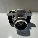 Topcon Re Super Slr Film Camera With Auto-topcor 58MM F/1.4 Lens. Fixed Price $419.00.
