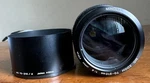 Minolta Md Zoom 70-210MM 1:4 Telephoto Camera Lens W/ Sun Shade Hood. Fixed Price $85.00.