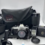 Nikon FG-20 Film Camera With Lens Series 50MM 1:1.8 Bundle. Fixed Price $149.99.