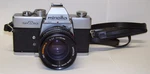 Minolta Srt 201 35MM Film Camera, Strap W/ Md 50MM F1.7 Rokkor Lens Exuc. Fixed Price $63.96.