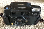 Yashica Full Automatic Focus Motor 38MM 1: 2.8 Lens / Strap, Case & Flash. Fixed Price $23.91.