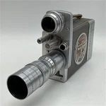 Vintage Bell & Howell 16MM Magazine Camera 200 Wollensak Raptar Cine. Fixed Price $160.00.