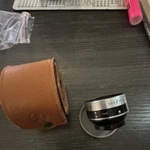 Sun Opt. Auxiliary Lens With Case For Cameras. Fixed Price $30.00.