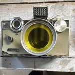 Argus C3 Beige Vintage Rangefinder Camera With Yellow Lens Filter. Fixed Price $50.00.
