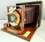 Antique Folding Camera Bausch & Lomb Pat. 1891 Unicum Shutter Bellows Wood Brass. Fixed Price $149.99.