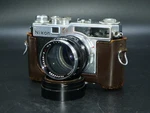 Early Nikon Sp Rangefinder Camera With Nikkor-p 8.5CM F/2 Lens & Hood. Works.. Fixed Price $895.00.