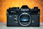 Black Canon Ftb-ql 35MM Slr Camera With 70-210 F/4 Fdn Zoom Lens Rare Find. Fixed Price $159.99.