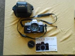 Minolta Srt 101 Slr Film Camera 58MM 1:1.4 Lens And Agfatronic 140A Flash. Fixed Price $84.00.