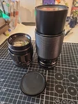 2X Camera Lens. Accura Diamatic Auto F=135MM Japan. And Albinar 767881 Korea. Fixed Price $20.00.