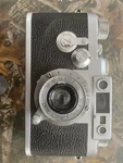 Leica Rangefinder Camera Black Silver With Leitz Elmar F=5CM 1:3.5 Lens. Fixed Price $1000.00.