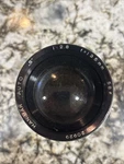 Hanimar Camera Lens Automatic 1:28 58 No. 20929 F=135MM. Fixed Price $24.99.