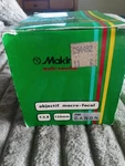New Makinon Automatic 1:2.8 135MM Camera Lens With Covers Canon Mount. Fixed Price $26.00.