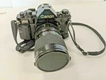 Canon A-1 Camera Tokina 28-85MM At-x 1:3.5-4.5 Lens Vivitar Uv-haze 62MM Fillter. Fixed Price $170.95.