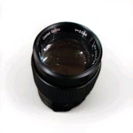 Jc Penny Coated Optics 135MM Camera Lens 2.5IN X 3.5IN With Black Carrying Case. Fixed Price $25.00.