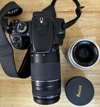 Canon Eos Xti Dslr Camera With 18-200MM Lens 85MM Fixed Bundle. Fixed Price $459.95.