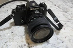 Nikon Em Camera W/ Wide Telephoto Zoom Lens - Bench Tested Well Nice!. Fixed Price $90.00.