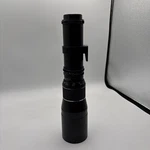 Super Coligon Zoom 1:5.6 F=300MM Telephoto Lens M42 Mount, Cf Adapter. Fixed Price $60.00.
