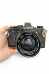 Olympus OM-2 35MM Slr Film Camera W/ Sigma Mini-wide 28MM F/2.8 Lens Vintage. Fixed Price $100.00.