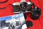 Yashica FX-2 Slr Film Camera With Dsb 50MM F/1.9 & Yus 135MM F/2.8 More. Fixed Price $39.00.