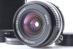 Nikon Ai Nikkor 20MM F/3.5 Wide Angle Lens W/ Hood 52MM Pl Filter Pouch Tesed. Fixed Price $239.99.