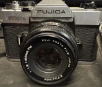 Fujica STX1N Camera W/ X-fujinon F=50MM 1:1.9 Lens. Fixed Price $40.00.