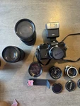 Nikon Black Vintage Slr Film Camera With Multiple Lenses. Fixed Price $168.75.
