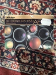 Nikon Af Nikkor 80-200MM F/4.5-5.6 Lens With Box, Caps And Manuals. Fixed Price $120.00.