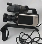 Montgomery Ward Zoom X6 Color Video Camera W/ Viewfinder Microphone & Handle Arm. Fixed Price $25.99.