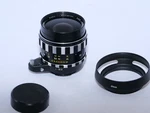 Exakta Steinheil Auto-d-quinaron 35MM F/2.8 W. A. Lens. Black. Hood. Caps. Cla. Fixed Price $325.00.