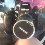 Nikon F4 Black 35MM Slr Film Camera Body W/ MB-21, MD-21 & Lens Cap. Fixed Price $180.00.