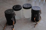 Nikon Nikkor Nippon Kogaku Leather Lens Cases And Plastic. Fixed Price $49.00.