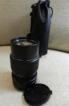 Bushnell Automatic 1:2.8 F=135 Mm No. 711511 Zoom Lens W/ Leather Pouch & Caps. Fixed Price $20.00.